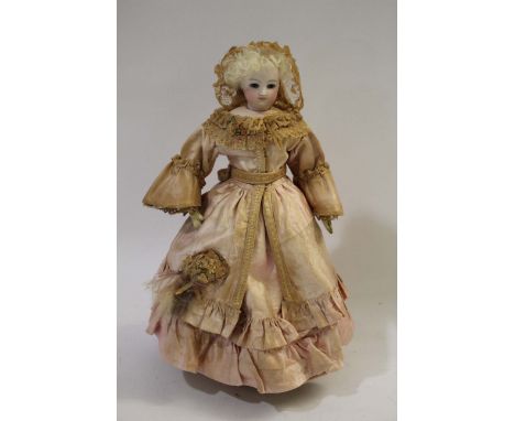 19THC FRENCH FASHION DOLL a French Barrois type fashion doll circa 1860, with a bisque swivel head and dark cobalt glass eyes