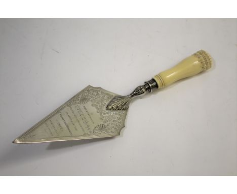 SRI LANKA INTEREST - 1911 PRESENTATION TROWEL a silver plated trowel with carved ivory handle, with an inscription Presented 