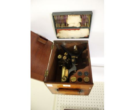 BOXED MICROSCOPE &amp; MICROSCOPE SLIDES a brass and metal monocular microscope by W Watson &amp; Sons, marked Holos Fram 108