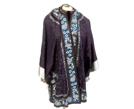 19THC CHINESE SILK JACKET a late 19thc indigo blue damask silk front fastening Chinese jacket, with a pale blue silk lining. 