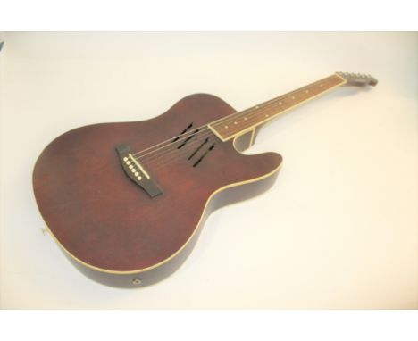 UNUSUAL TENNESSEE GUITAR an unusual 6 string fretless electro acoustic guitar with volume controls on one side, the sound hol