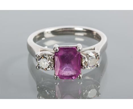 PINK SAPPHIRE AND DIAMOND THREE STONE RING
the central cushion cut pink sapphire approximately 1.70 carats, flanked by two br