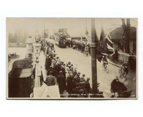 A large collection of postcards in two albums and loose, including topographical views, artist and greetings postcards, inclu
