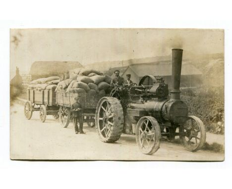 PYECOMBE. A photographic postcard of a steam engine passing a Belgravia Dairy Coy Ltd sign, the engine with 'W. Wyatt Paul, P