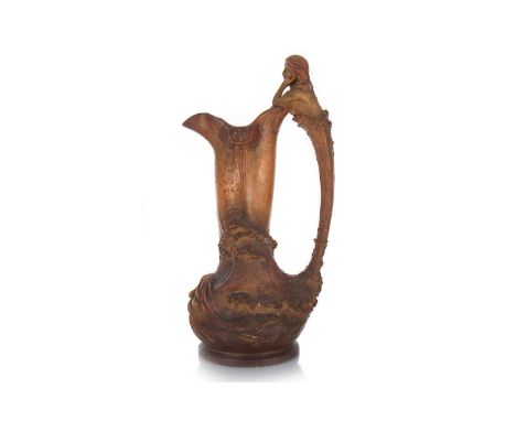 JOHANN MARESCH, ART NOUVEAU PAINTED EARTHENWARE PITCHER, CIRCA 1880-1900 the shaped body with upper Art Nouveau stylised lotu