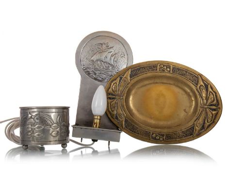 GLASGOW SCHOOL, ARTS & CRAFTS BRASS DISH, CIRCA 1910-20 of oval form, the hammered border repousse with opposing butterflies 