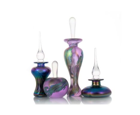 FOUR AMERICAN IRIDESCENT GLASS PERFUME BOTTLES, of baluster and squat ovoid form, each indistinctly signed, two dated 1993 an