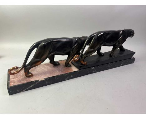 FRENCH ART DECO ANIMALIER STUDY OF TWO PANTHERS, EARLY 20TH CENTURY patinated spelter, on rectangular marble base70cm longThe