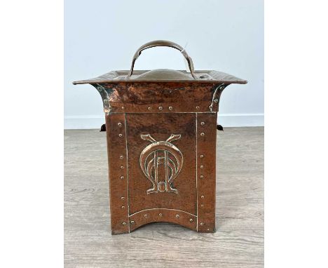 ARTS & CRAFTS COPPER COAL / LOG BOX, LATE 19TH / EARLY 20TH CENTURY hammered and riveted with repousse stylised motif to eith