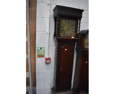 An 18th Century brass clock face , having 30 hour movement, named for Wethered , Kirkby Lonsdale in later oak case