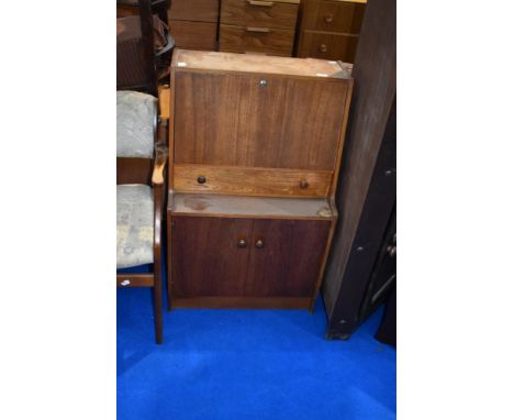 A vintage teak bureau of small proportions, approx dimensions W61 D36 H98cm