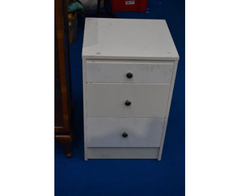 A vintage painted bedside chest