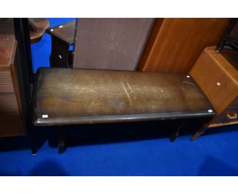 A vintage dark stained Ercol style coffee table, approx 120cm x 46cm