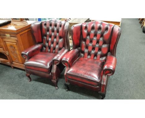 PAIR OF OX BLOOD BUTTON BACK ARMCHAIRS 