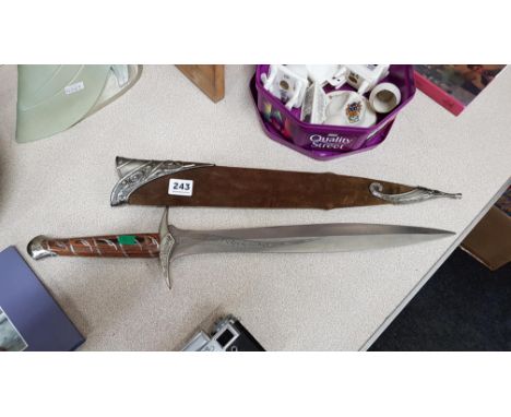 LORD OF THE RINGS, FRODOS STING SWORD, 22 INCHES LONG, STEEL BLADE WITH ELVEN INSCRIPTION AND WOODEN HANDLE, COMES WITH MEAL 