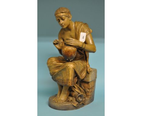 A Goldscheider figure, of a seated figure with an urn, 1973/439/7, (a.f.) 47 cm high