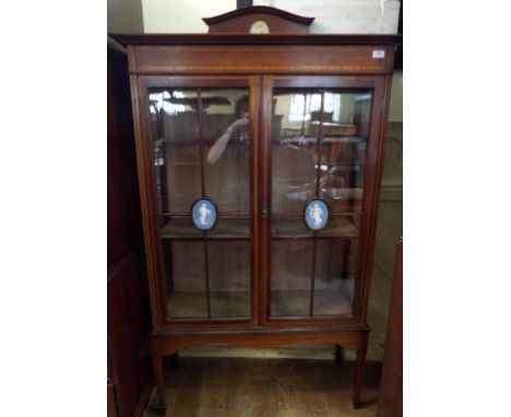 An Edwardian inlaid mahogany display cabinet, inset Jasperware style panels, 99 cm wide Condition report Report by GH

The Ja