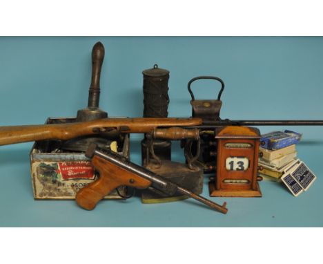 A spring loaded air rifle, an air pistol, a perpetual calendar, a carriage lamp, and other items, and a 1920's car radiator l