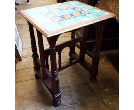 A late Victorian/Edwardian walnut occasional table, with a tile inset top, 53 cm wide Condition report Report by GH

The occa