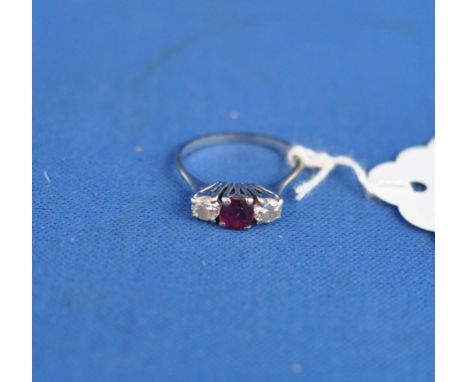 An 18ct white gold, ruby and diamond ring