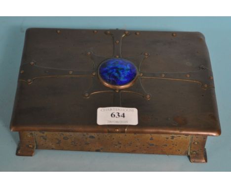 An Arts & Crafts style copper box, decorated an enamel roundel, 20 cm wide Condition report Report by GH

The copper box:

Ta