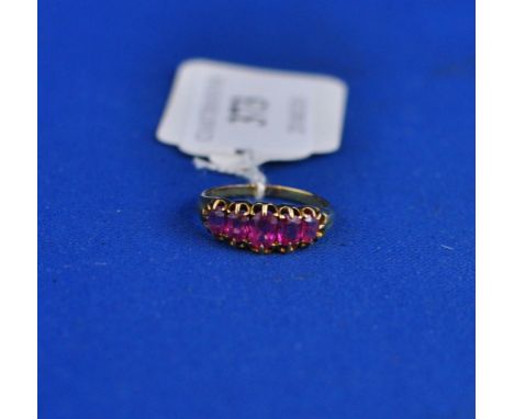 A yellow coloured metal and five stone ruby ring Condition report Report by NG

Total weight approx. 3.3 g (all in)
Approx. r