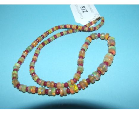 An opal and ruby faceted bead necklace