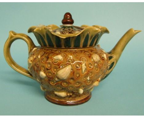 A Doulton Lambeth stoneware teapot and cover, decorated shells, 2201, (some chips) 13 cm high