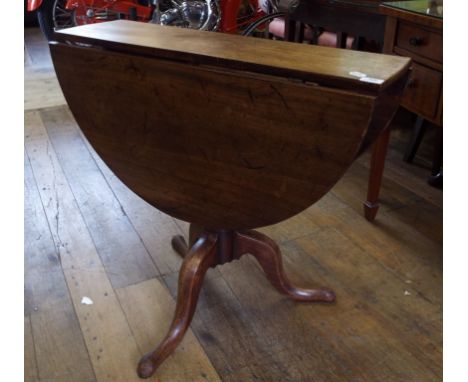 A mahogany drop leaf table, on tripod base, 96 cm wide