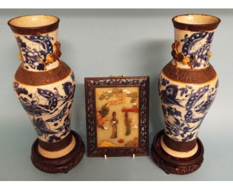 A pair of blue and white pottery vases, decorated insects, flowers and foliage, 30.5 cm high, similar ceramics, a bronzed box