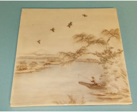 A Japanese porcelain panel, decorated a fisherman, 21.5 cm square