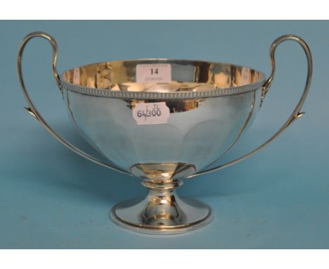 A silver two handled pedestal bowl, Birmingham 1912, approx. 27.5 ozt (patch repair), 18.5 cm high