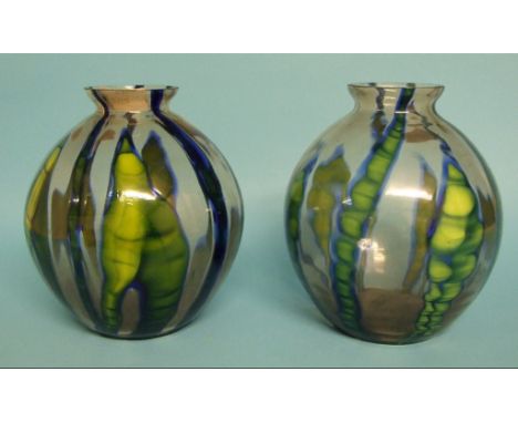 A clear, green and blue glass vase, 19.5 cm high, its pair, a gilt metal and porcelain oil lamp base, converted to electricit