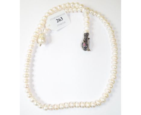 A pearl necklace, with a silver, sapphire and ruby clasp