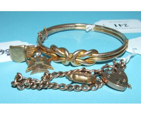 A 9ct gold bangle, a padlock bracelet, with a pig charm, a signet ring, and a Maltese cross pendant, approx. 20.2 g (4)