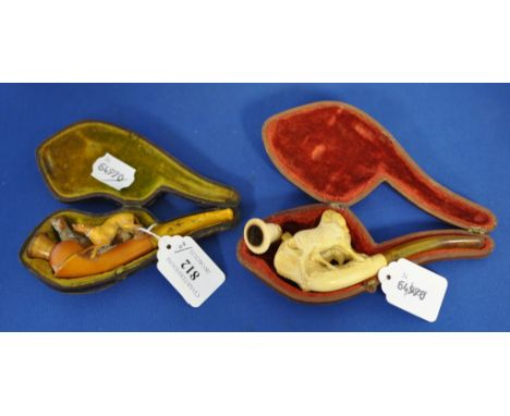 A Meerschaum pipe, the bowl carved two horses, and another, both cased (2) Condition report Report by GH

Condition to both p