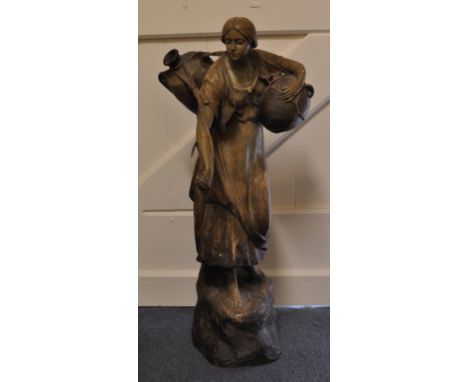 A Goldscheider figure, of a water carrier, 2597/35/24, (a.f.) 76 cm high