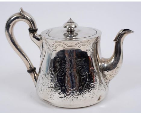 A Victorian silver teapot, with engraved decoration, initialled, John Samuel Hunt, London 1852, approx. 21.9 ozt (all in) 16 