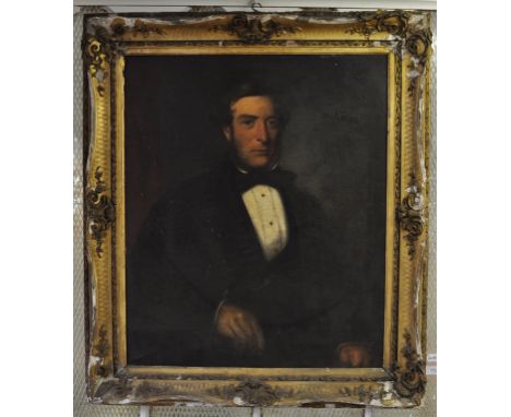 English school, 19th century, a half length portrait of a gentleman seated, oil on canvas, 75 x 62 cm