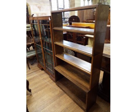 Three oak bookcases, a mahogany sideboard, four doors, a table screen, and a carpet section (10)