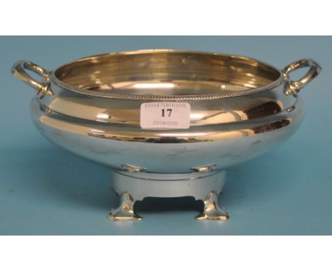 A silver pedestal bowl, on four pad feet, Sheffield 1928, approx. 26.1 ozt (patch repair), 13 cm high