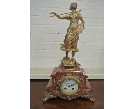 A 19th Century French 8 Day Clock - on marble base - 3" dial with painted flower - gilt mount and feet - the top showing a gi