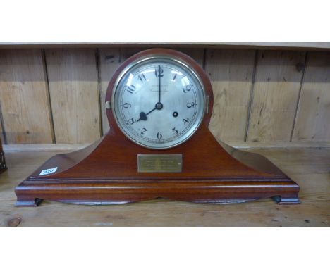 An 8 day mahogany case mantle clock Muncey, Cambridge with a silvered dial, strikes on hours and half - 28cm x 55cm 