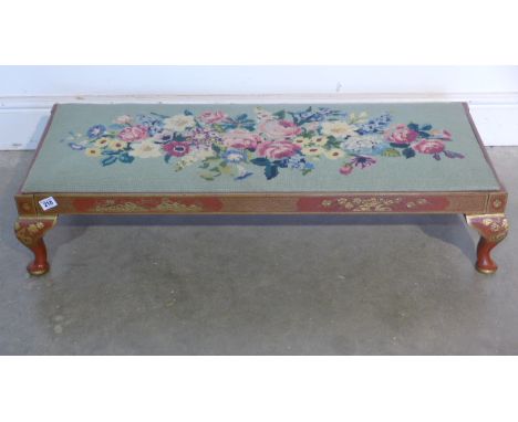 A red lacquered chinoiserie footstool with a tapestry top 