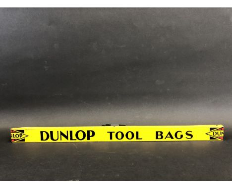 A Dunlop Tool Bags shelf strip in good condition.