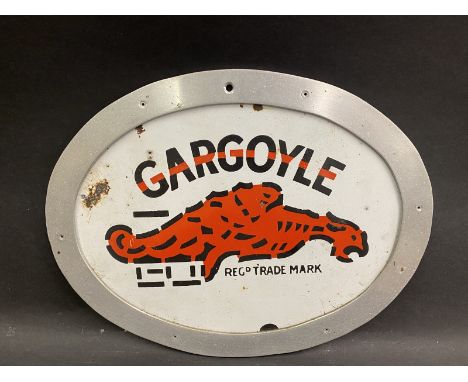 A Gargoyle oval enamel sign, trimmed and framed to mount on the wall, 12 1/2 x 9 1/2". 