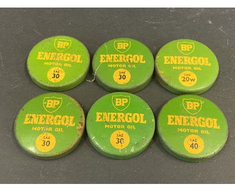 Six BP Energol oil bottle caps. 