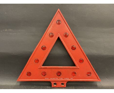 A triangular cast aluminium warning road sign with integral reflectors, stamped Royal Automobile Club London SW1, made by Fai