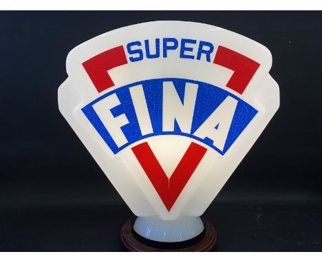 A reproduction Super Fina glass petrol pump globe, good condition. 