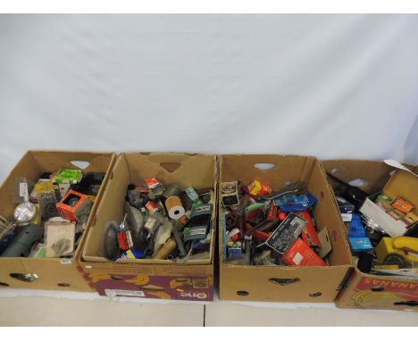 Five boxes of tools, parts including boxed bulbs etc. 
